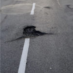 pothole on road