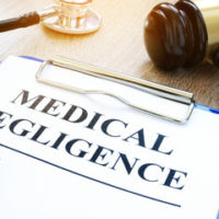 Blue clipboard Medical negligence
