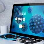 medical desktop computer with covid-19 info