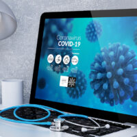 medical desktop computer with covid-19 info