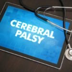 Cerebral palsy (neurological disorder) diagnosis medical concept on tablet screen with stethoscope